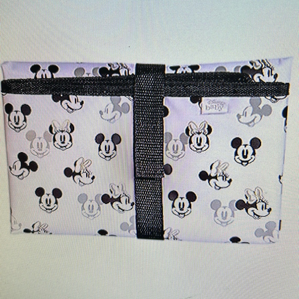 Disney  changing. Pad new in the original package.